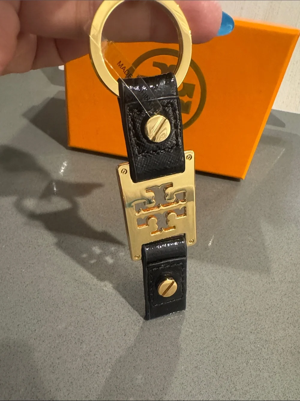 Tory Burch Black Patent Leather Keyring with Gold Logo Plate